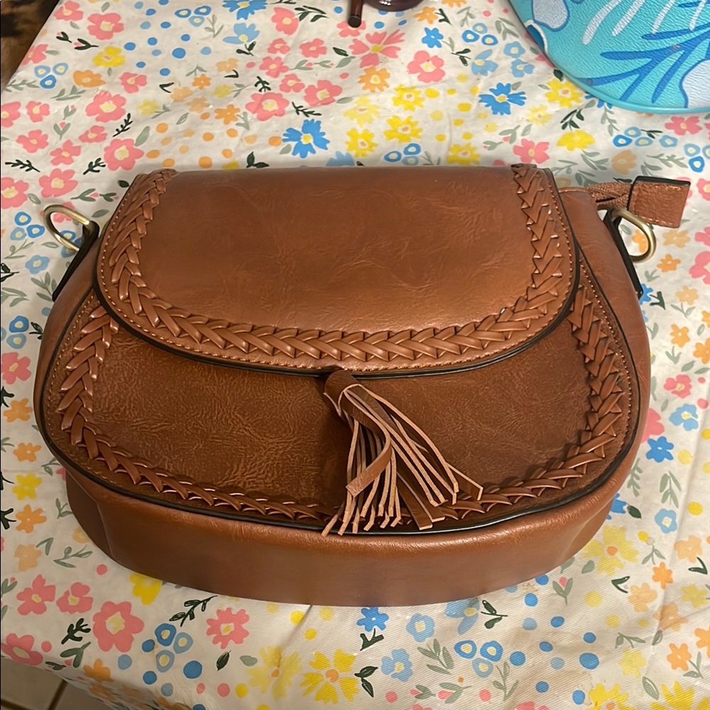 Brown Leather Crossbody Bag with Tassel and Flap Closure